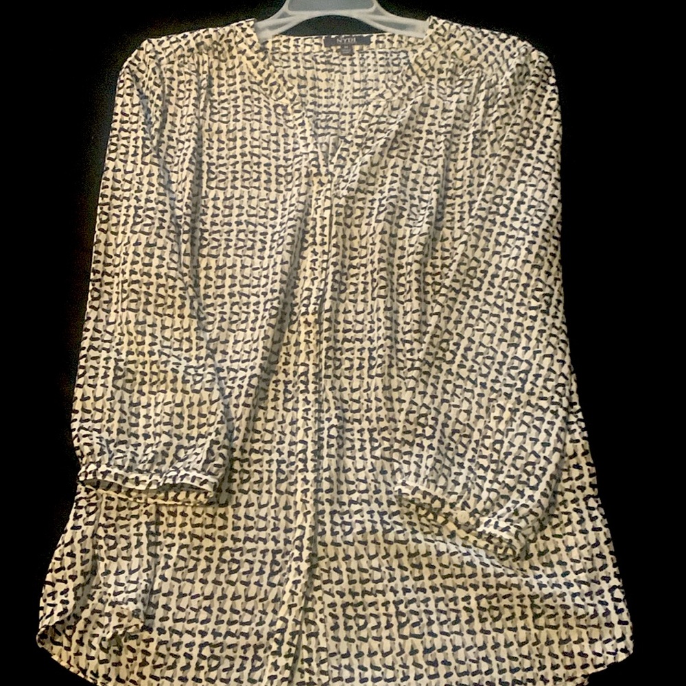 NYDJ buttoned down blouse in medium. 3 quarter length sleeves. Light and flowy.